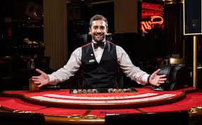 Live roulette wheel mounted in studio setup with broadcast cameras